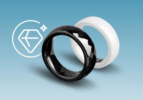 Divi gredzeni: balts un melns ar spīdīgu virsmu. Uz gredzena iekšpuses redzams VISA logotips.